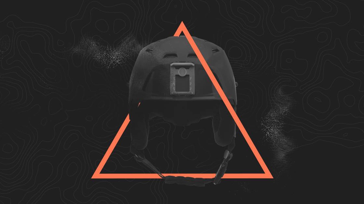 Image of black helmet with orange triangle graphic