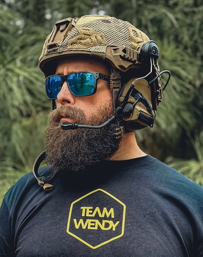Image of bearded man wearing sunglasses and helmet