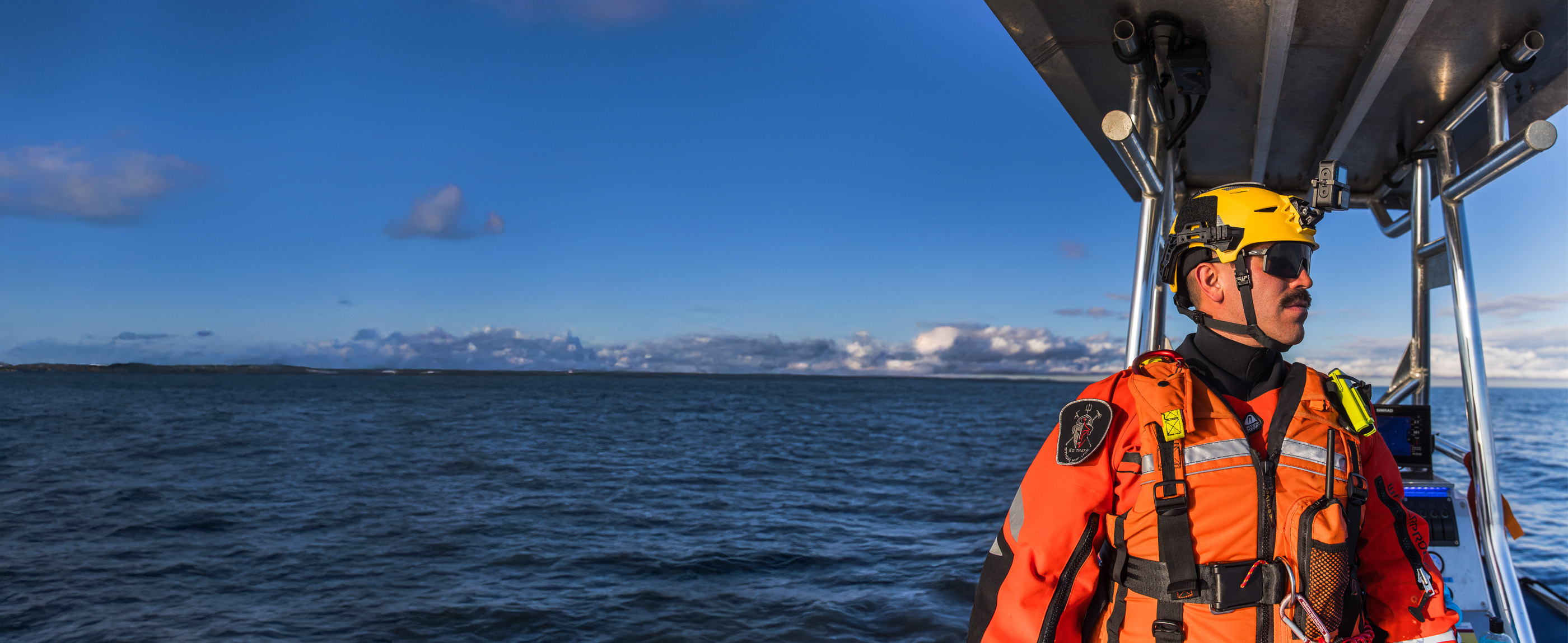 Team Wendy Rescuer helmet worn by search and rescue team member during a water rescue mission