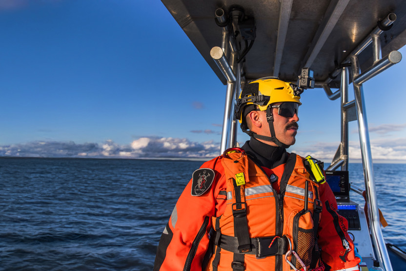 Team Wendy Rescuer helmet worn by search and rescue team member during a water rescue mission