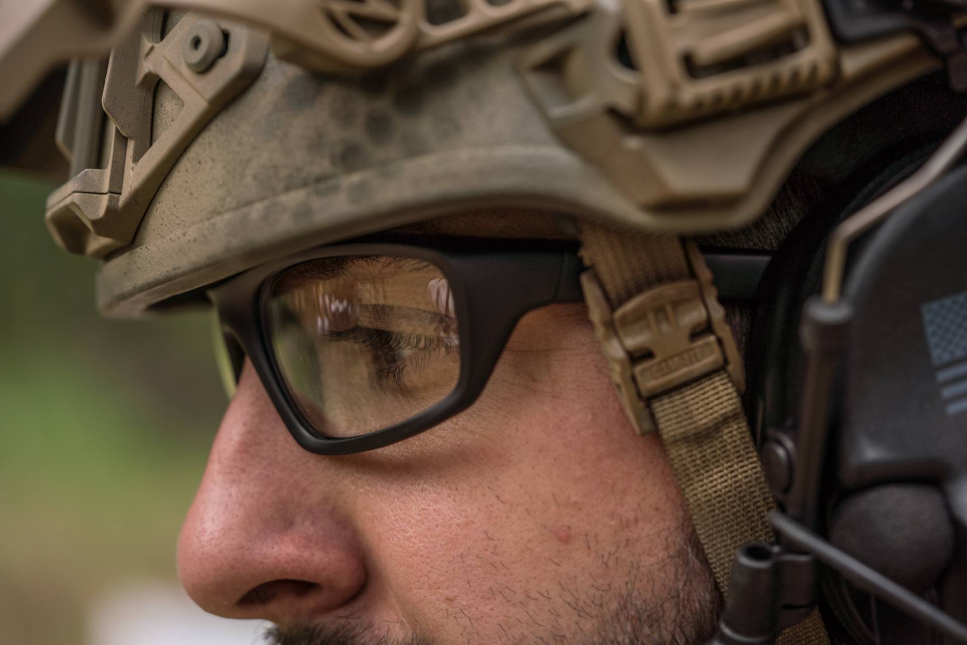 Close up of man in helmet wearing eye protection