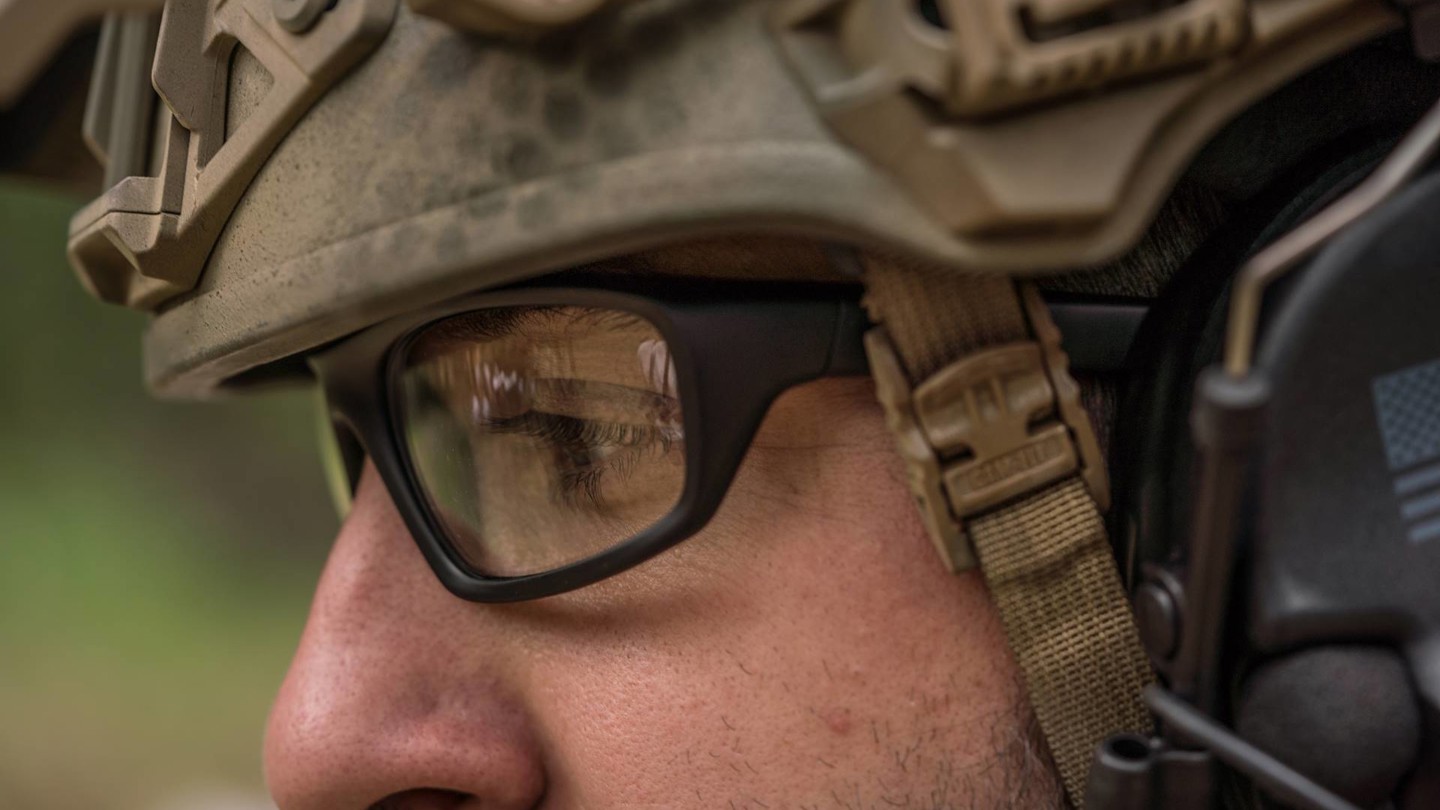 Close up of man in helmet wearing eye protection