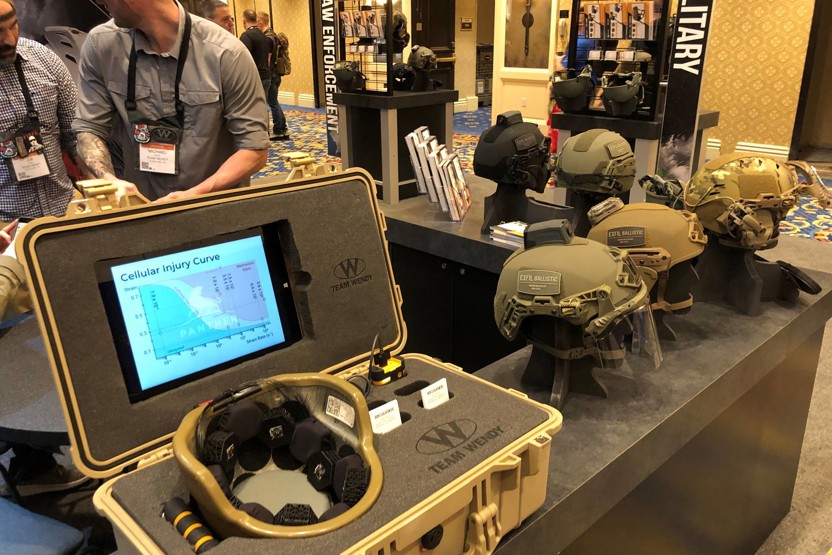 Image of tablet and helmet in a case