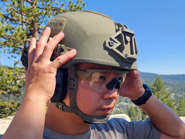 Man holding onto his helmet