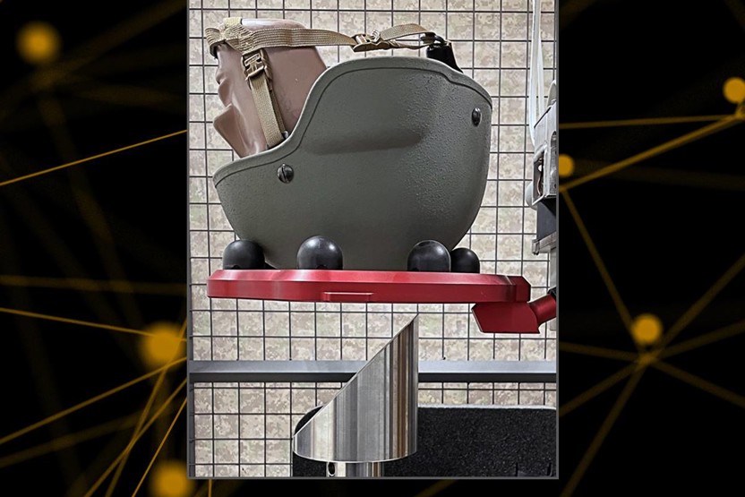 Helmet on a dummy head being tested