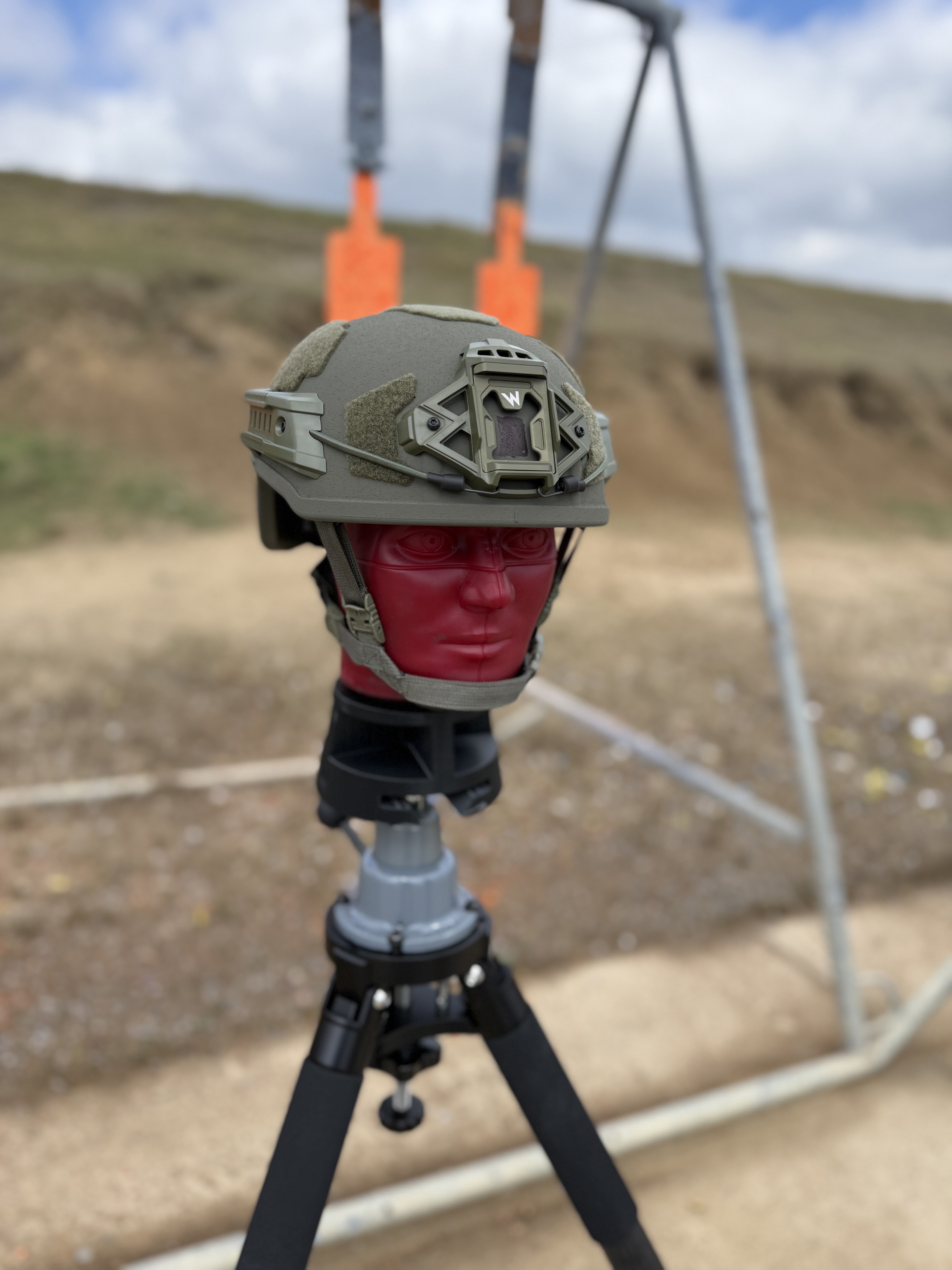 red headform with a ranger green Team Wendy helmet