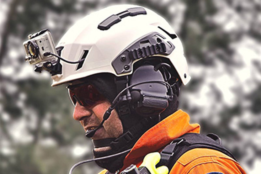 Man in white helmet with camera strapped to it