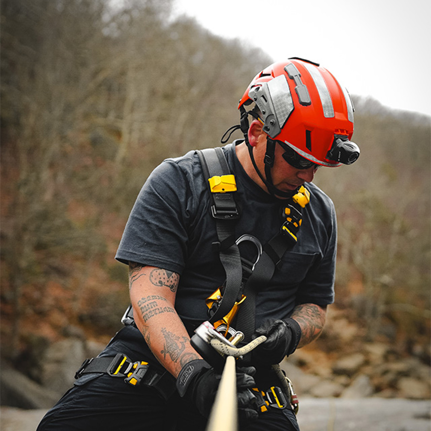Man wearing a harness and a helmet