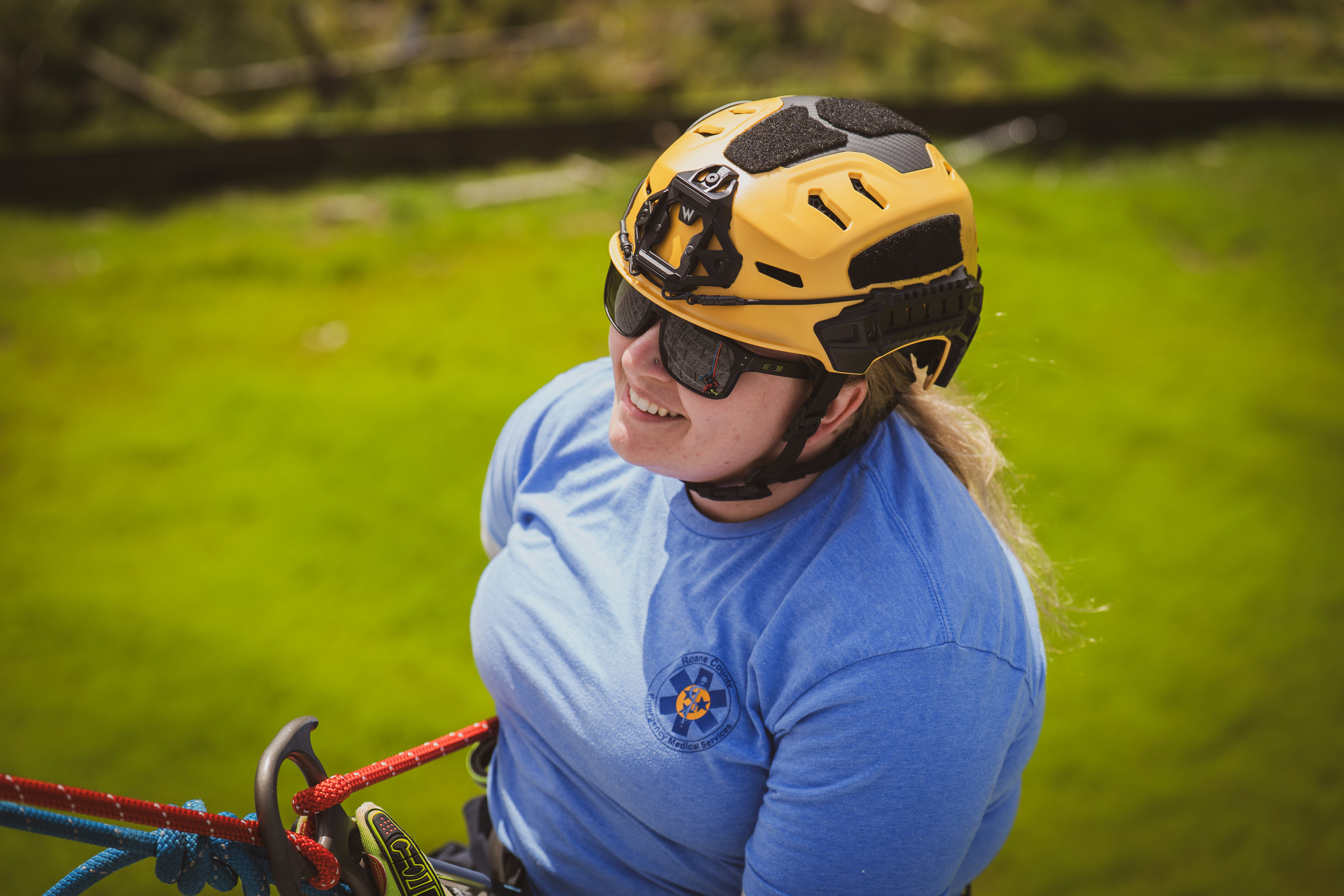 Search and Rescue professional wearing a Team Wendy RECON Tactical helmet rappelling down a wall