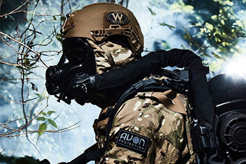 Image of person in camo and helmet