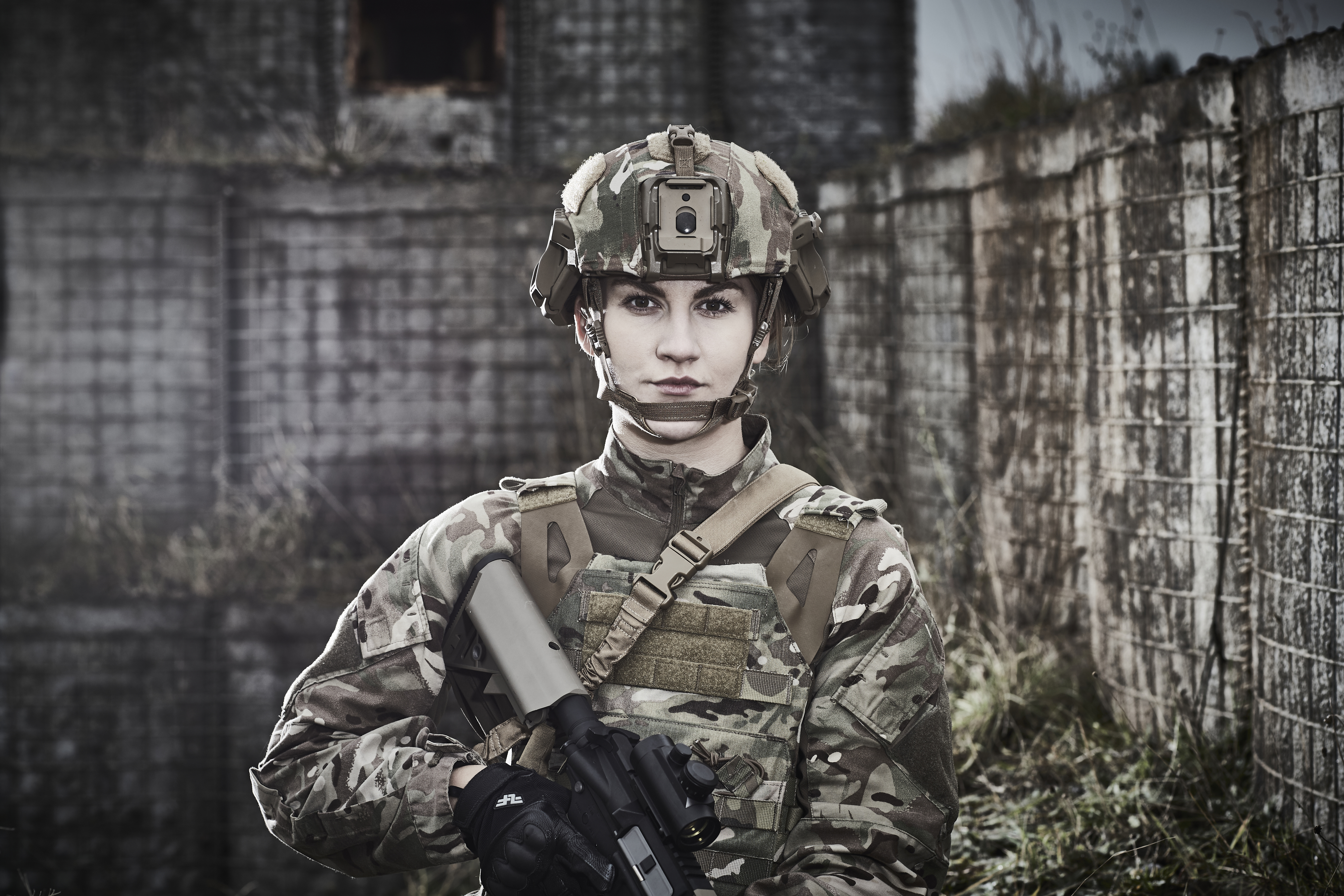 Image featuring a woman wearing camouflage Team Wendy helmet and clothing